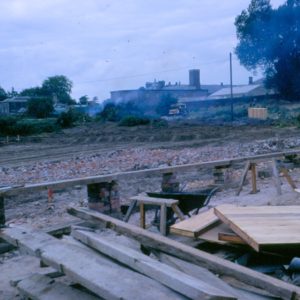 Early stage building of Canterbury Campus - largely muddy ground looking towards Canterbury Prison.