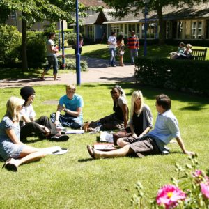 Students on the lawn with Erasmus Building behind.