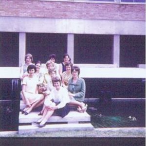 The first ever residents of the top floor of Davidson Hall of Residence sitting on the pond steps in the Quad.