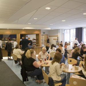 The cafe area in Rowan Williams Court, Medway, full of students.