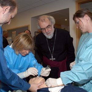 Opening of the Medway Campus. Staff and students demonstrate medical techniques to the Archbishop of Canterbury.
