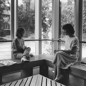 Two female students relaxing in the Student Union.